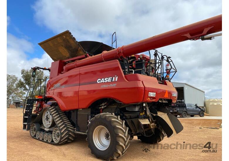 caption 2021 CASE IH 8250 AFS CONNECT HARVESTER ON TRACKS