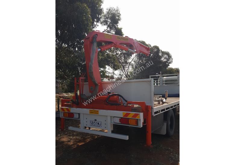 caption Crane truck long bed tray