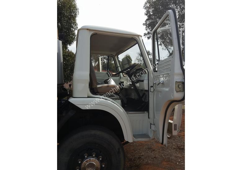 caption Crane truck long bed tray