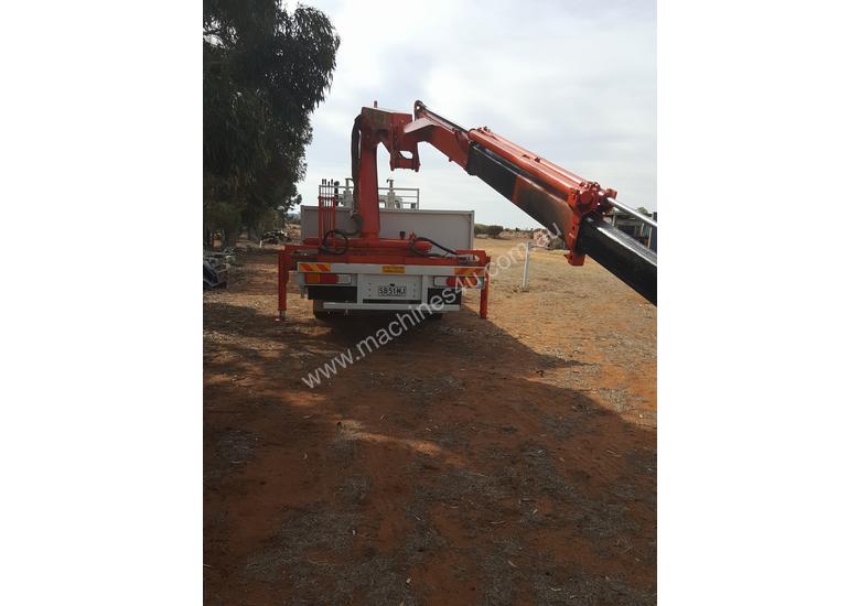 caption Crane truck long bed tray
