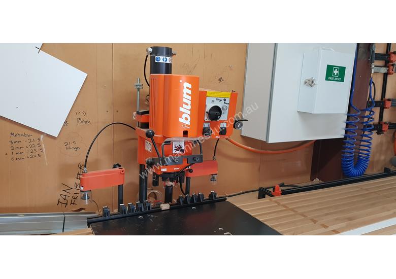 caption Cabinet making machine Blum mini press and drill press