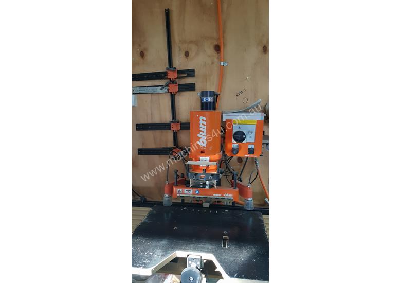 caption Cabinet making machine Blum mini press and drill press
