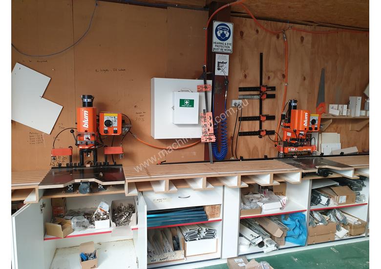 caption Cabinet making machine Blum mini press and drill press