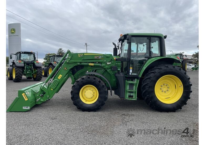 caption 2019 John Deere 6140M Utility Tractors