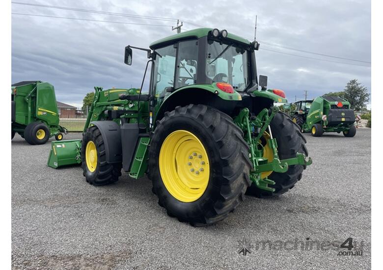 caption 2019 John Deere 6140M Utility Tractors
