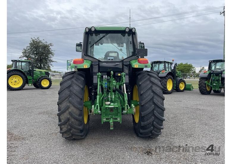 caption 2019 John Deere 6140M Utility Tractors