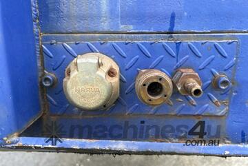 1974 Haulmark Tri Axle Flat Top Trailer