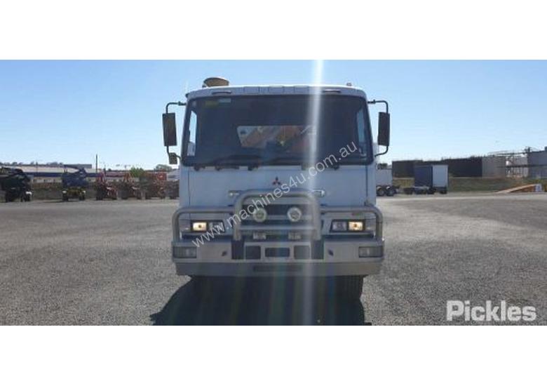 caption 2010 Mitsubishi FS500