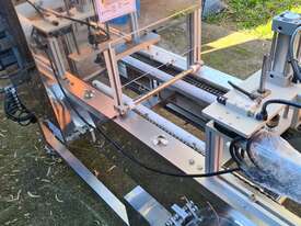 Fully Automatic Linear Tray & Bucket Sealing Machine - picture1' - Click to enlarge