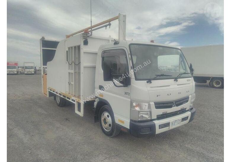 caption Mitsubishi Canter