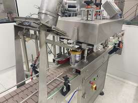 Plastic Lid Applicator And Pressing Unit - picture0' - Click to enlarge