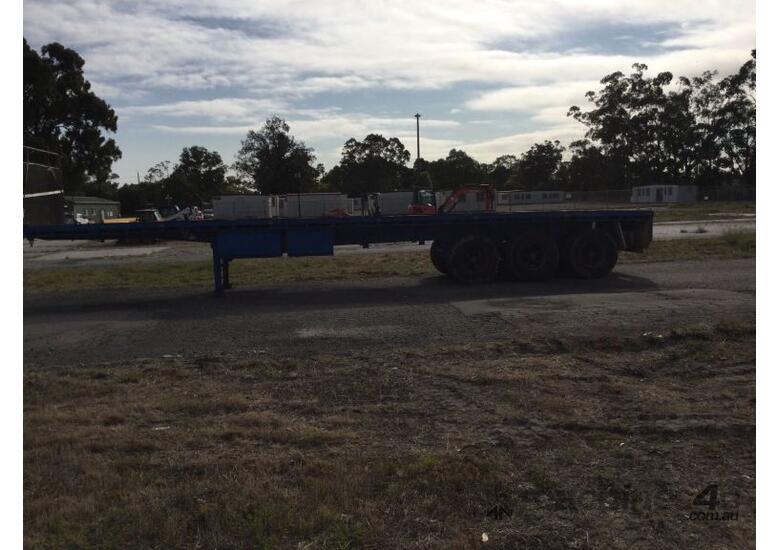 caption 1994 Haulmark 3ST37 Tri Axle Flat Top Trailer