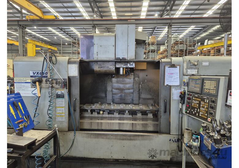 caption Used VX650 Hyundai CNC Machine - Fanuc Control for sale
