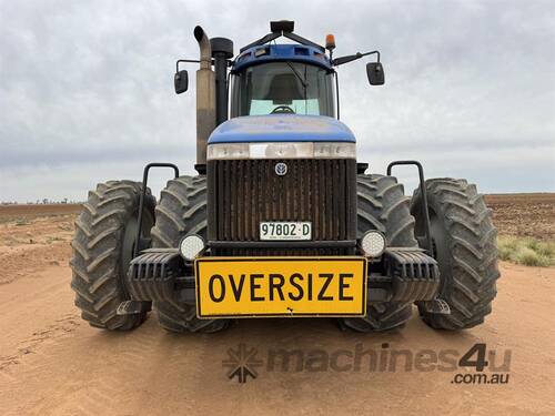 caption NEW HOLLAND TJ500 TRACTOR