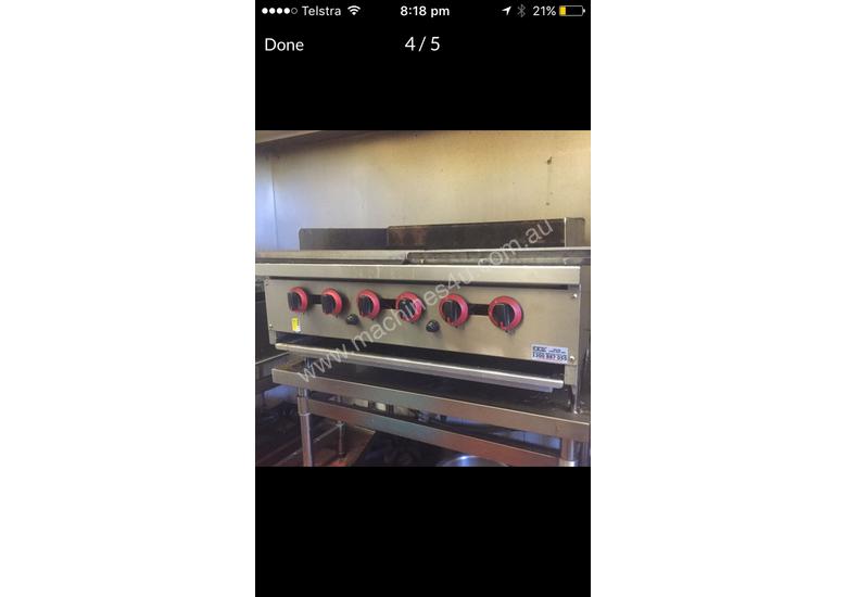 caption Gas char grill burners