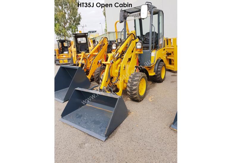 caption UNUSED HT35J Articulated Mini Wheel Loader with Perkins Engine complete with GP Bucket & Pallet Fork