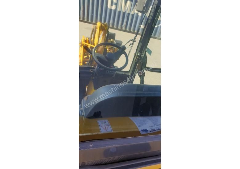 caption UNUSED HT35J Articulated Mini Wheel Loader with Perkins Engine complete with GP Bucket & Pallet Fork