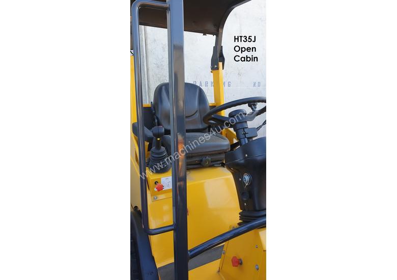 caption UNUSED HT35J Articulated Mini Wheel Loader with Perkins Engine complete with GP Bucket & Pallet Fork