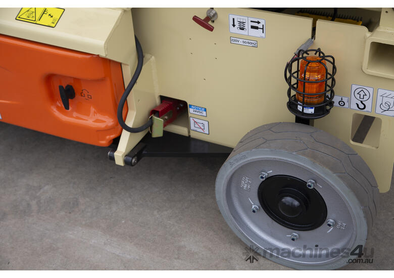 caption JLG 32ft Electric Scissor Lift – Powerful, Compact & Ideal for Your Indoor Projects! For Hire!