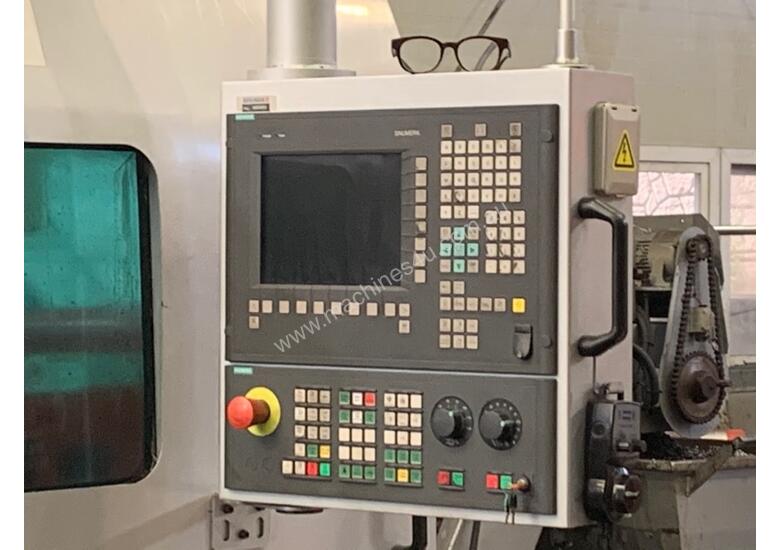caption 2012 Hwacheon Mega 130x3000 CNC Lathe