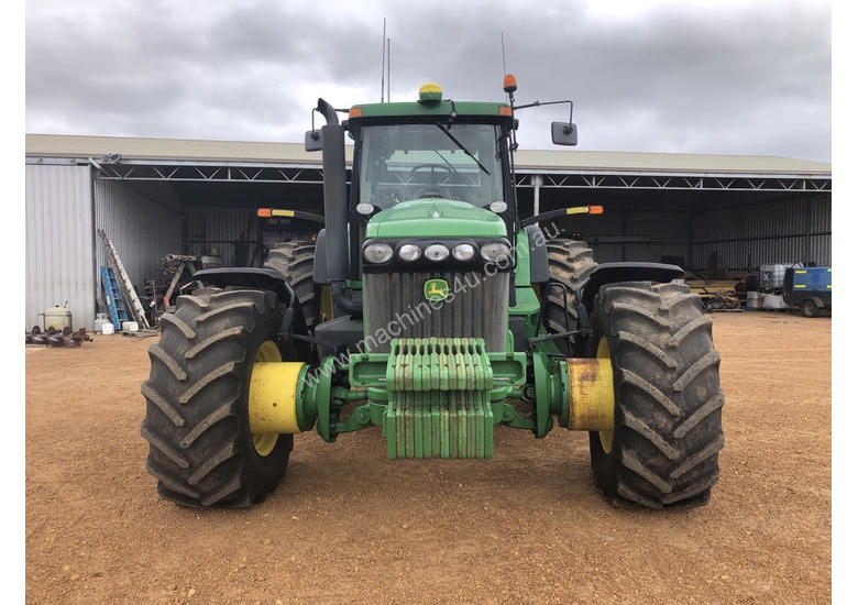 caption John Deere 8320 FWA/4WD Tractor