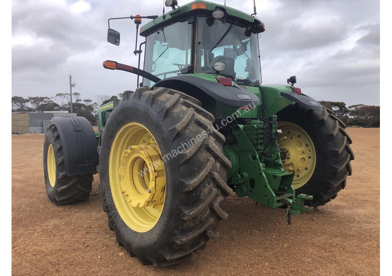caption John Deere 8320 FWA/4WD Tractor