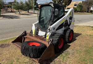 Skid Steer Bobcat S650 2011 A/C 4 in 1 bucket 2892hrs