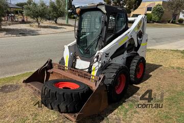 Skid Steer Bobcat S650 2011 A/C 4 in 1 bucket 2892hrs