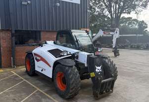 Bobcat TL30.60 Telehandler. Has seen more chickens than Colonel Sanders.