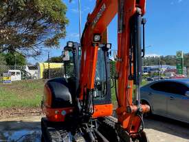 Kubota KX040-4 Tilt Hitch and Angle Blade - picture0' - Click to enlarge