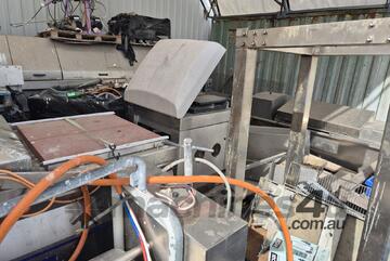 Cretel Swing lid vacuum bagger