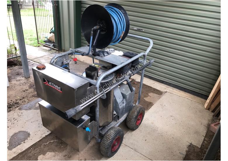 caption $5,800 Hot Water Pressure Washer