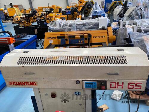 caption Fedek DH-65 CNC bar feeder