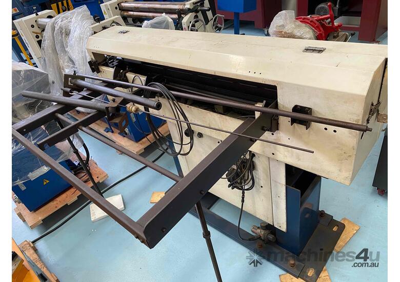caption Fedek DH-65 CNC bar feeder