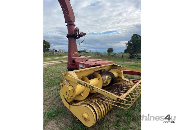 caption NEW HOLLAND 718 FORAGE HARVESTER