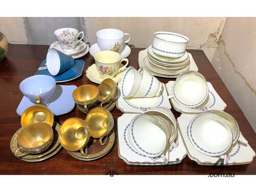 caption QTY OF TRIOS & CUP/SAUCER SETS
