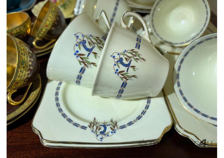 caption QTY OF TRIOS & CUP/SAUCER SETS