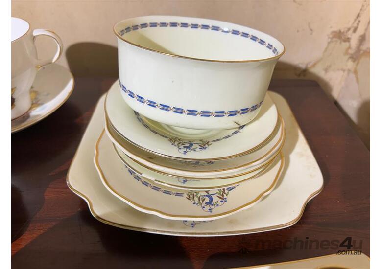 caption QTY OF TRIOS & CUP/SAUCER SETS