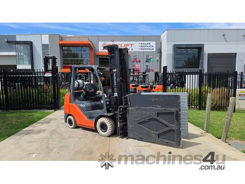 caption Toyota Forklift 3T with White Goods Clamp