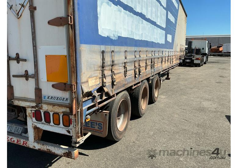 caption 2003 Krueger ST-3-38 Tri Axle Drop Deck Curtainside Trailer