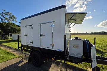 Slide on (removable) Ice Cold room Box with legs sitting on OFF Road Trailer