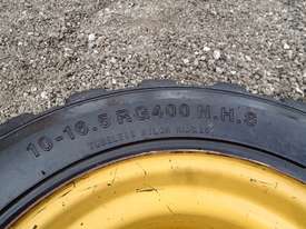 CATERPILLAR SOLID FILLED 226B3 8 STUD RIM TYRE Tyre/Rim Combined Tyre/Rim - picture1' - Click to enlarge
