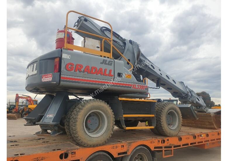 caption JLG GRADALL TELESCOPIC EXCAVATOR