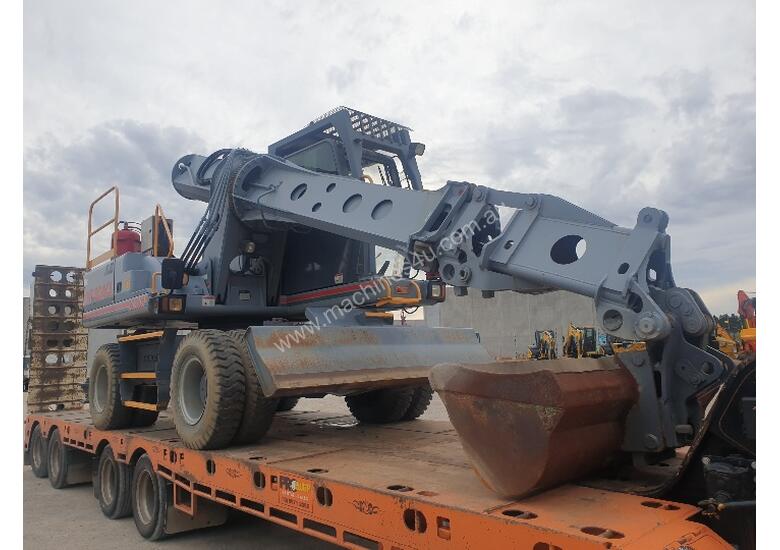 caption JLG GRADALL TELESCOPIC EXCAVATOR