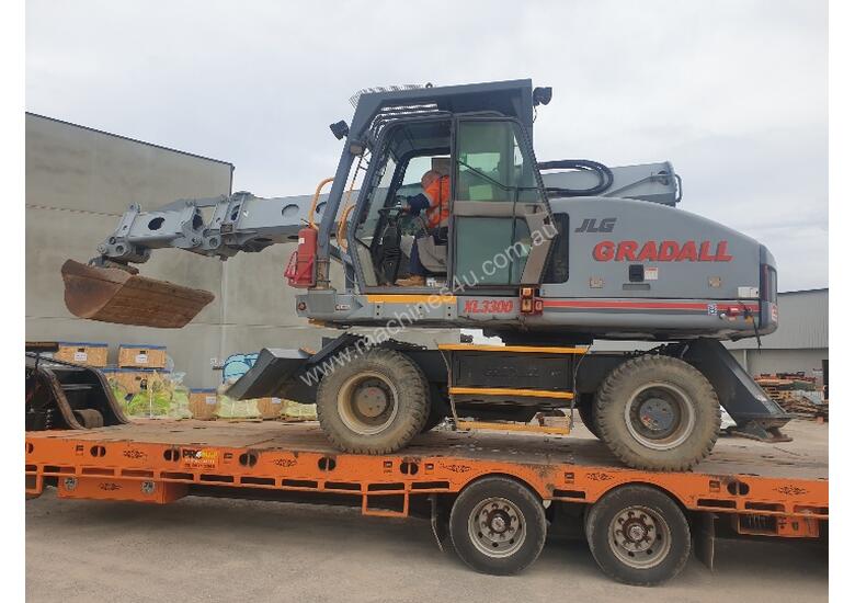 caption JLG GRADALL TELESCOPIC EXCAVATOR