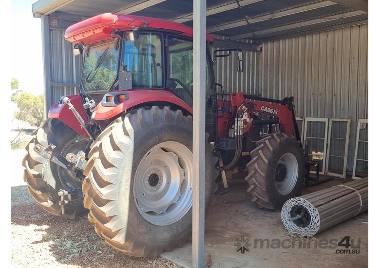 caption 2013 CASE IH FARMALL JX110 TRACTOR