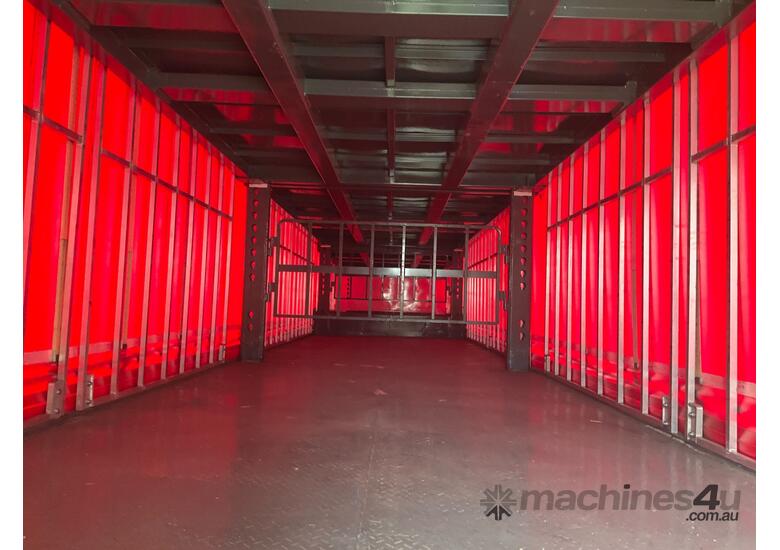 caption 2024 AAA Trailers MCSDDT Tri Axle Drop Deck Curtainside Trailer