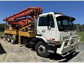 1995 NISSAN CWB450 CONCRETE BOOM TRUCK - picture0' - Click to enlarge