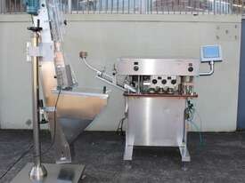 Automatic Spindle Inline Capper with Feeding Elevator. - picture13' - Click to enlarge