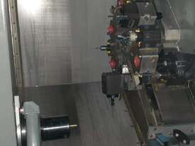 CNC 3 axis Lathe with Auto Bar Feeder - picture0' - Click to enlarge